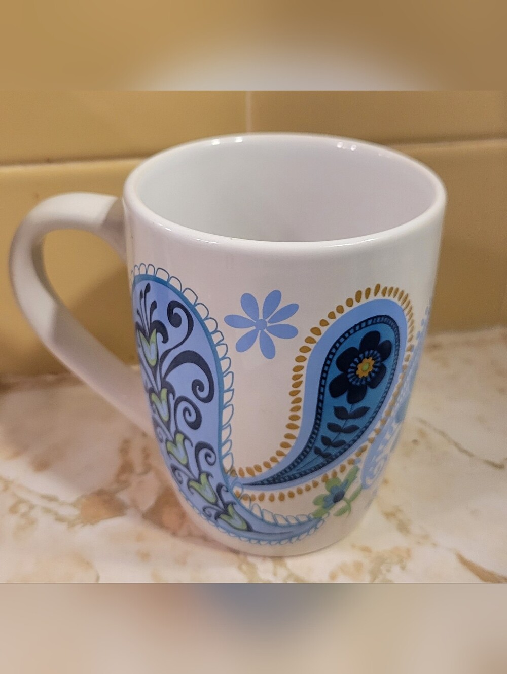 White Ceramic Mug with Blue Paisley Floral Design